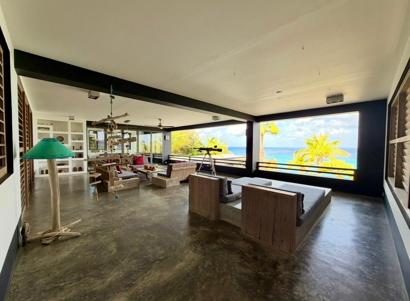 View of Lounge through to the dining room. The dining room that can be enclosed and air conditioned 