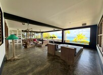 View of Lounge through to the dining room. The dining room that can be enclosed and air conditioned
