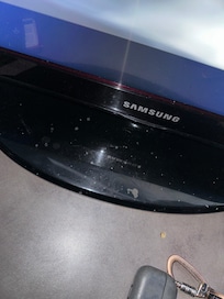 Stains on the TV base.