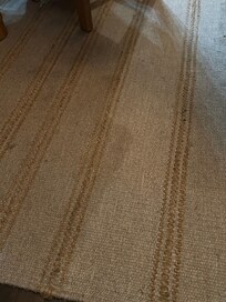Rug under dining table