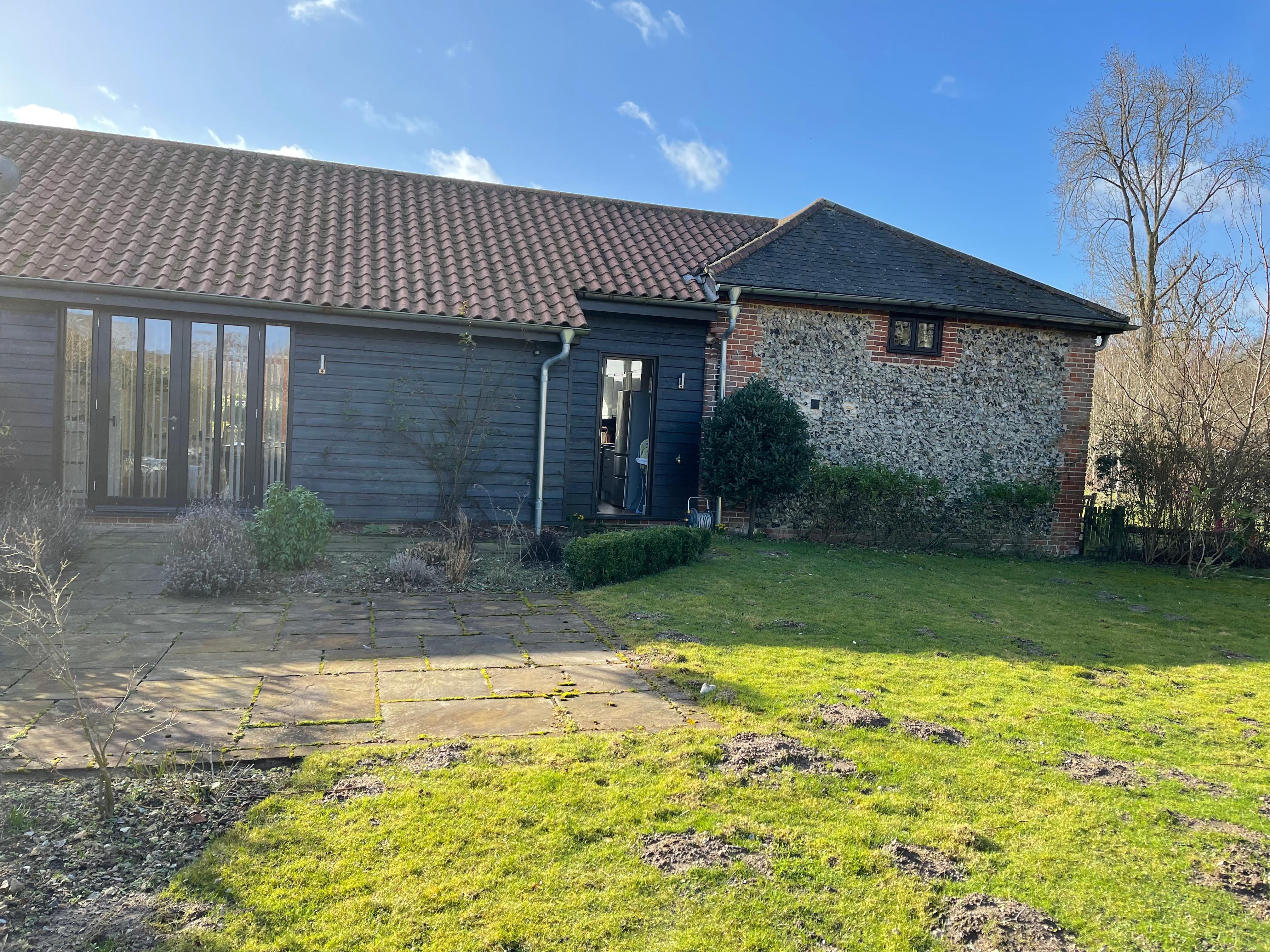 View of cottage from rear garden