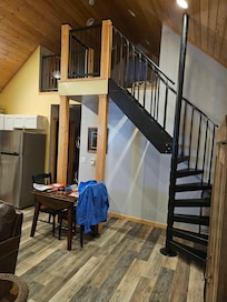 Staircase to loft that has 2 twin beds
