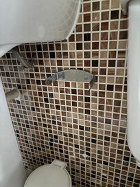 Broken toilet roll holder