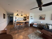 Hallway, kitchen and part of the living room.