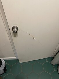 Bathroom door from inside, also toilet was not set right so it moved when you sat down