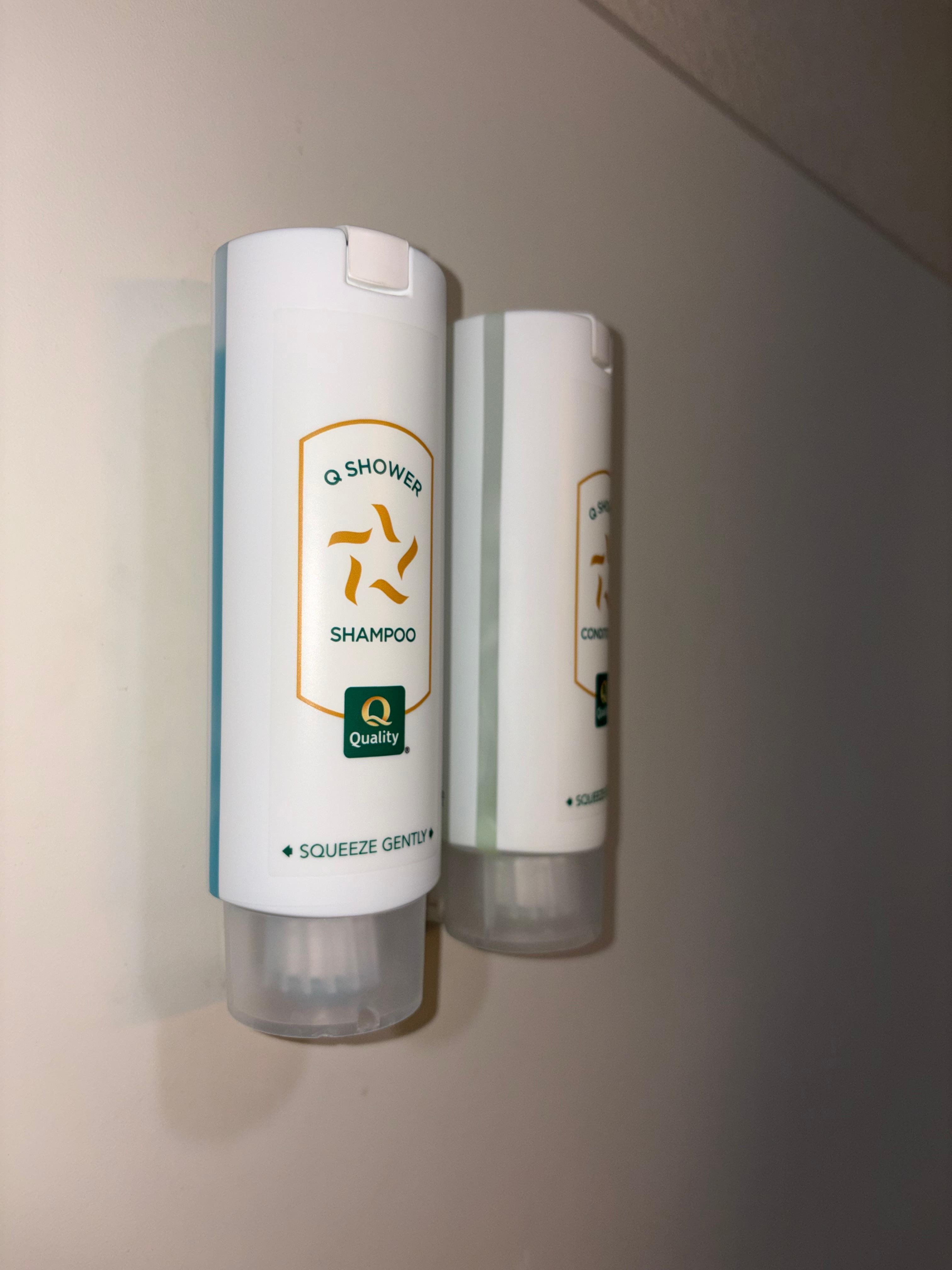 Shampoo on the left. Empty conditioner on the right 