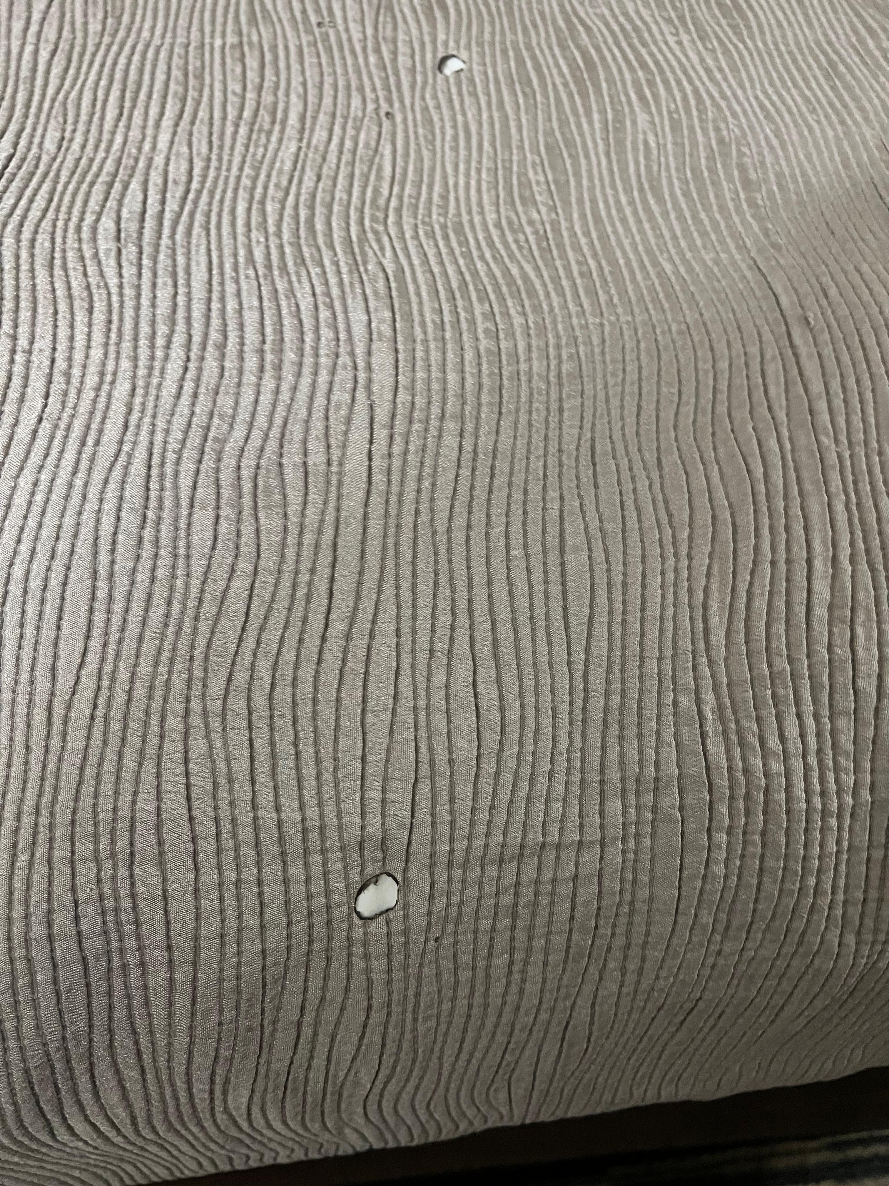 Burn hole in bedspread