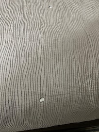 Burn hole in bedspread