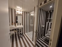 Clean well equipped bathroom.