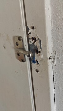 Door lock was broken off.