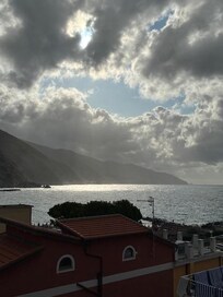 Dawn, looking down the coastline from a balcony.
