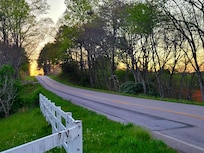 Sunset at the end of the driveway