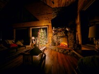 A cozy living room and fireplace.