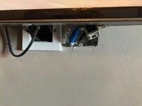 Exposed electrics under wall mounted tv