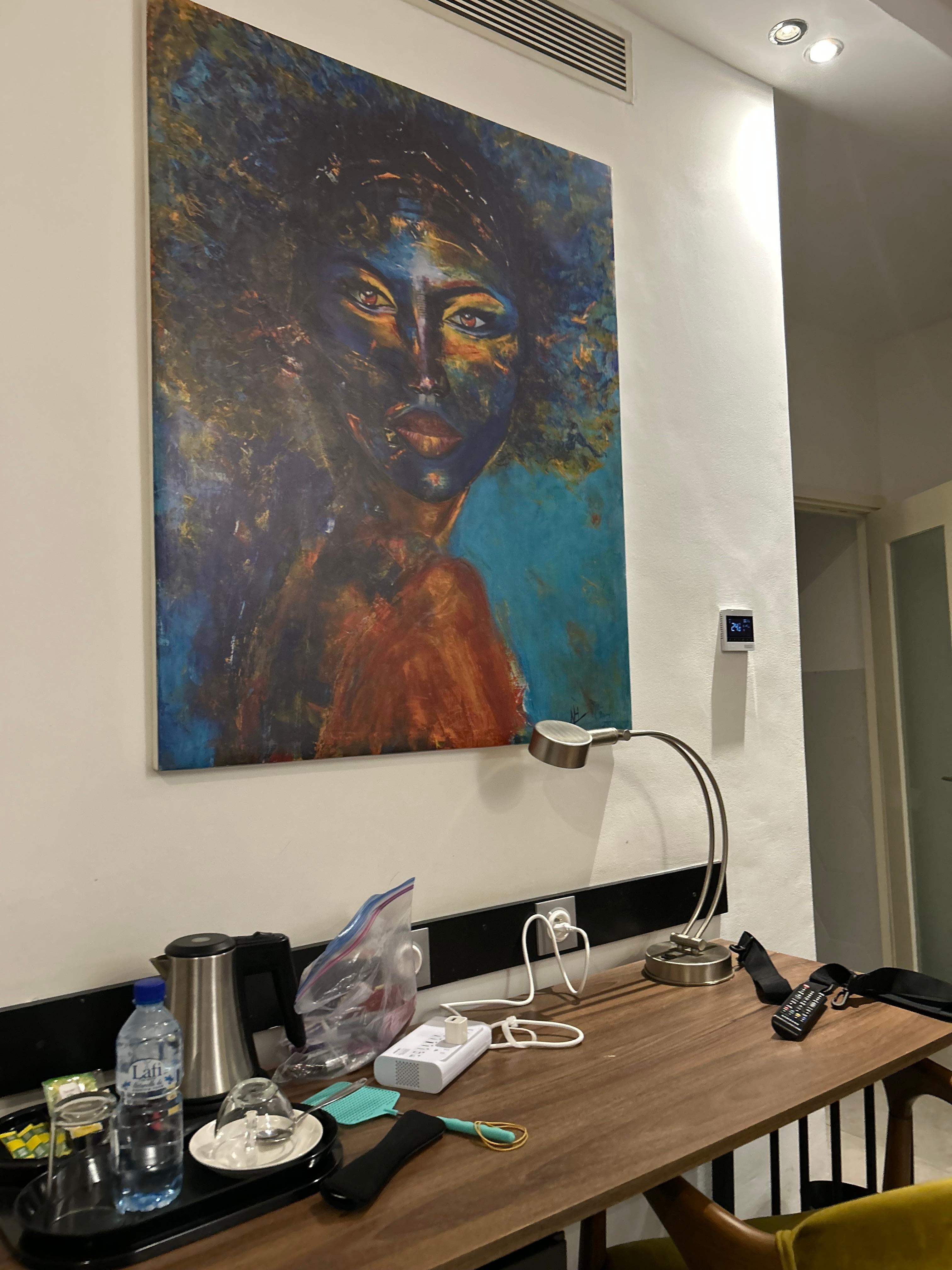 Beautiful art 🖼️ on the wall in the room.