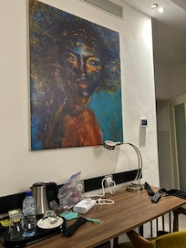 Beautiful art 🖼️ on the wall in the room.