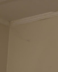 Over your head above the bed.