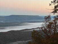 Second morning, fog filled valley