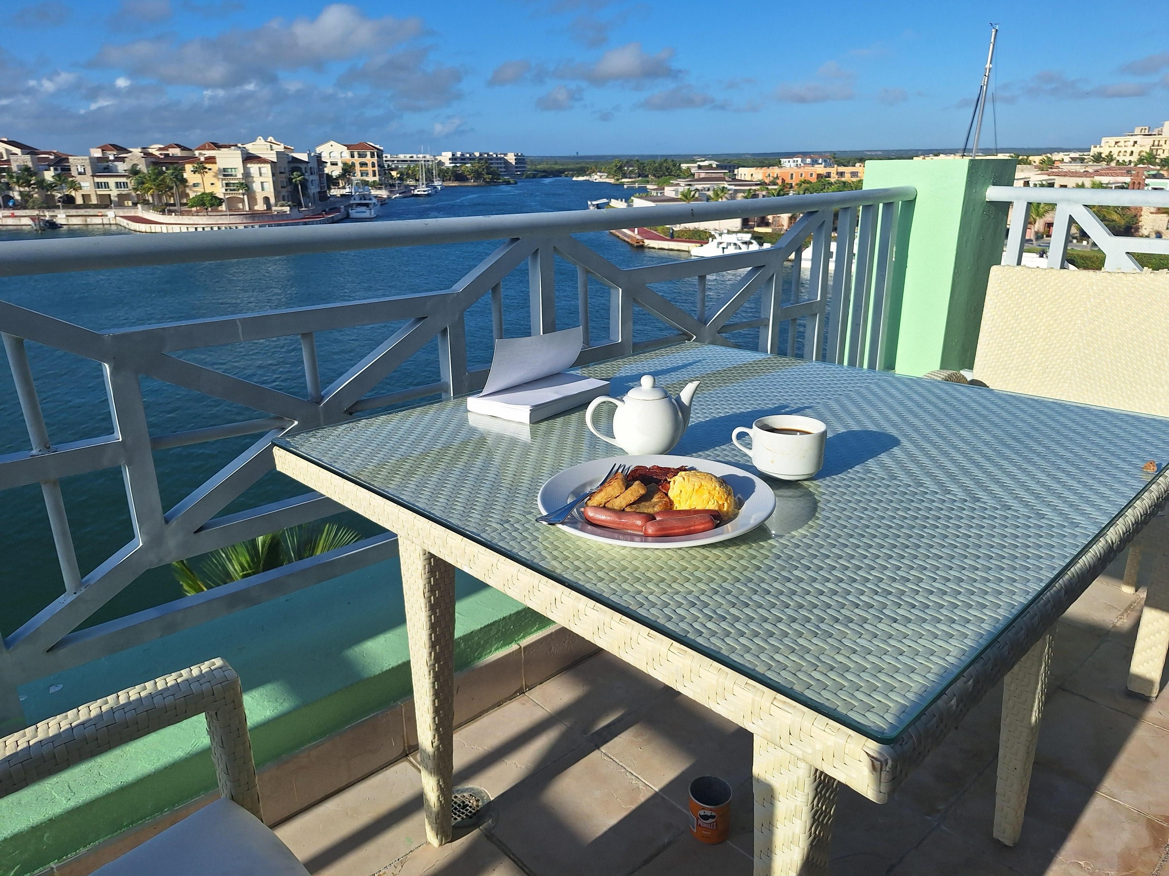 enjoying breakfast on balcony