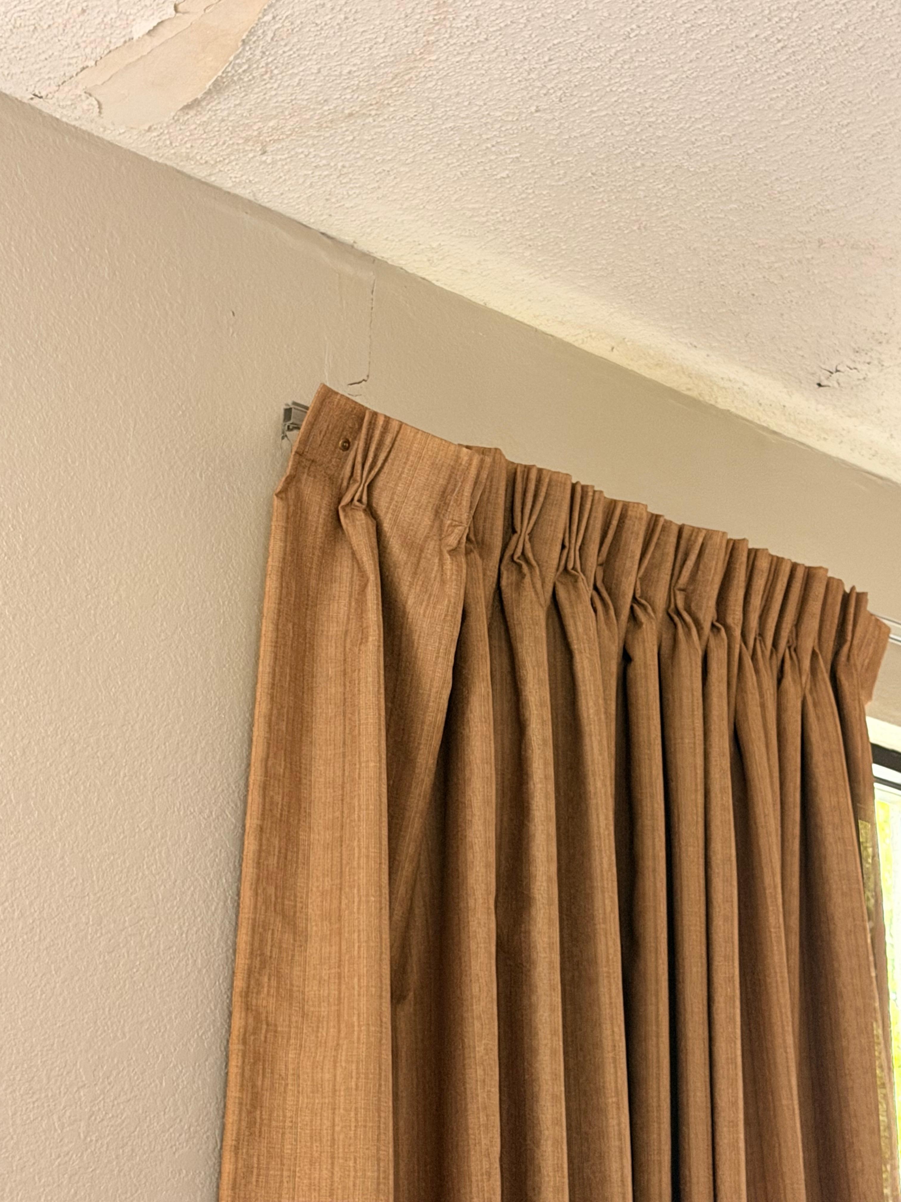 Water stains on the ceiling and peeling drywall