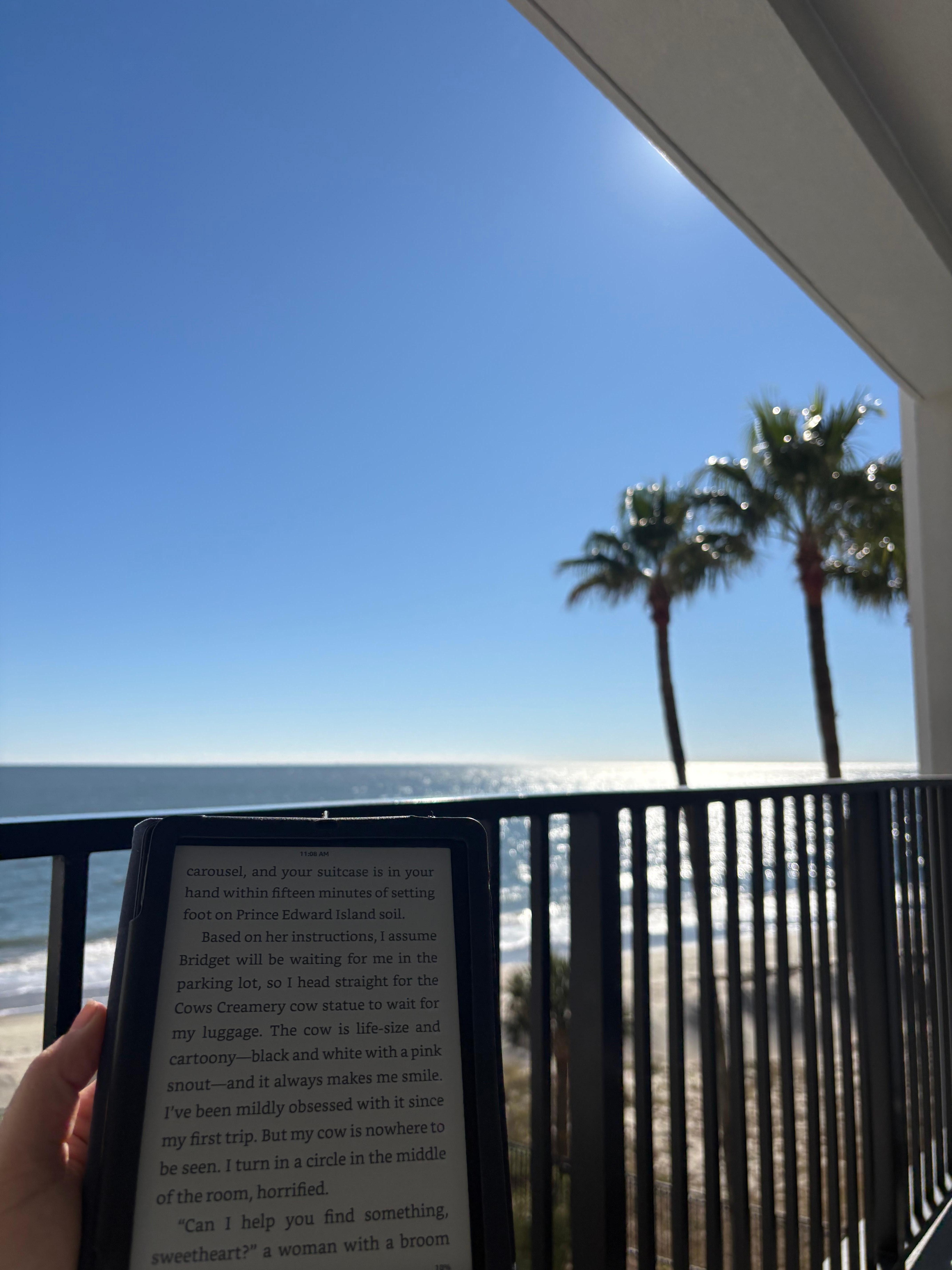 Comfortable chairs and a couch can be found on this large balcony that is perfect for reading while sipping morning coffee!