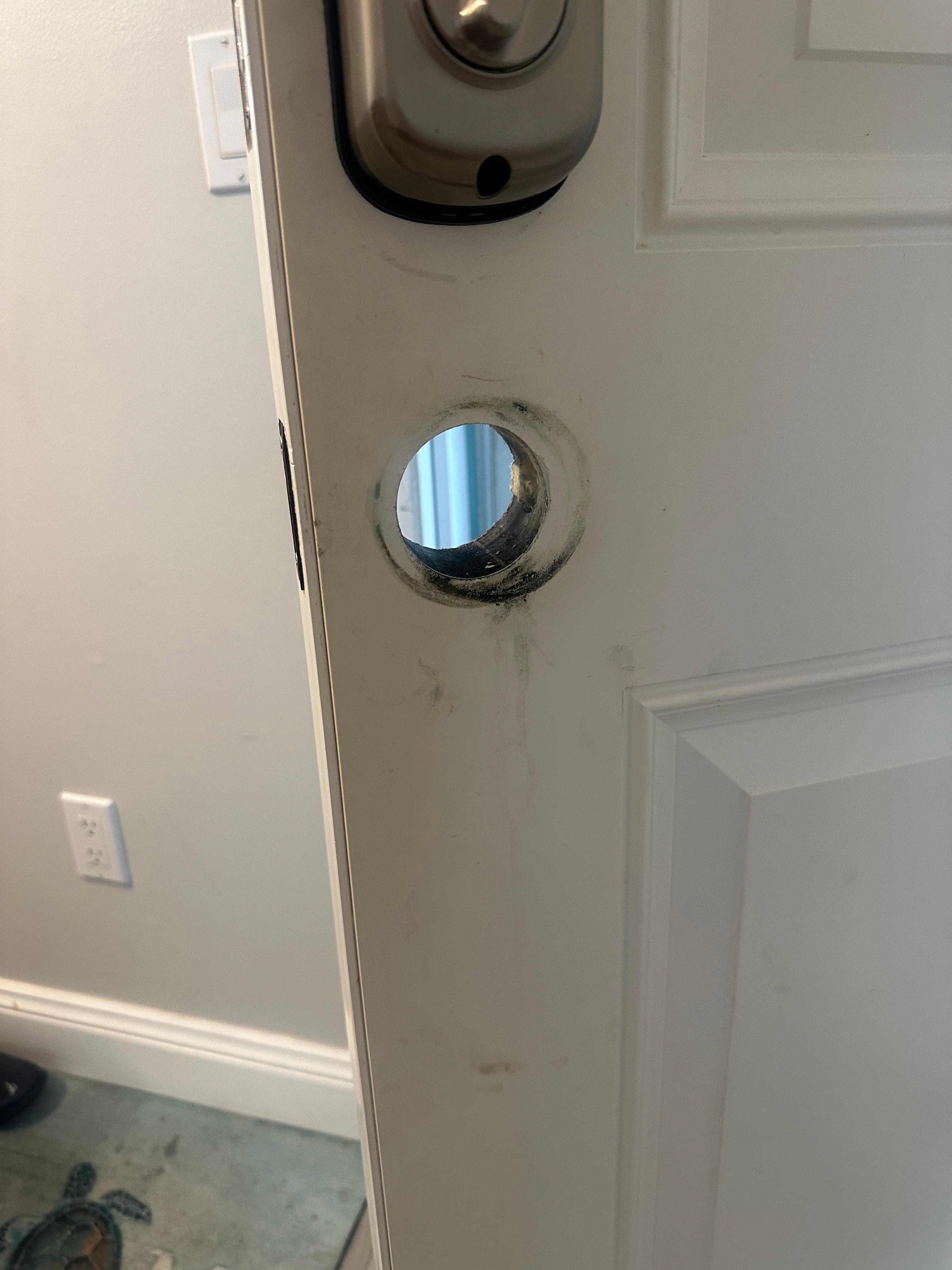 The area where the doorknob that I had to remove was.  If there was a fire, my whole family would have been dead, as there is no fire extinguisher in the room.  