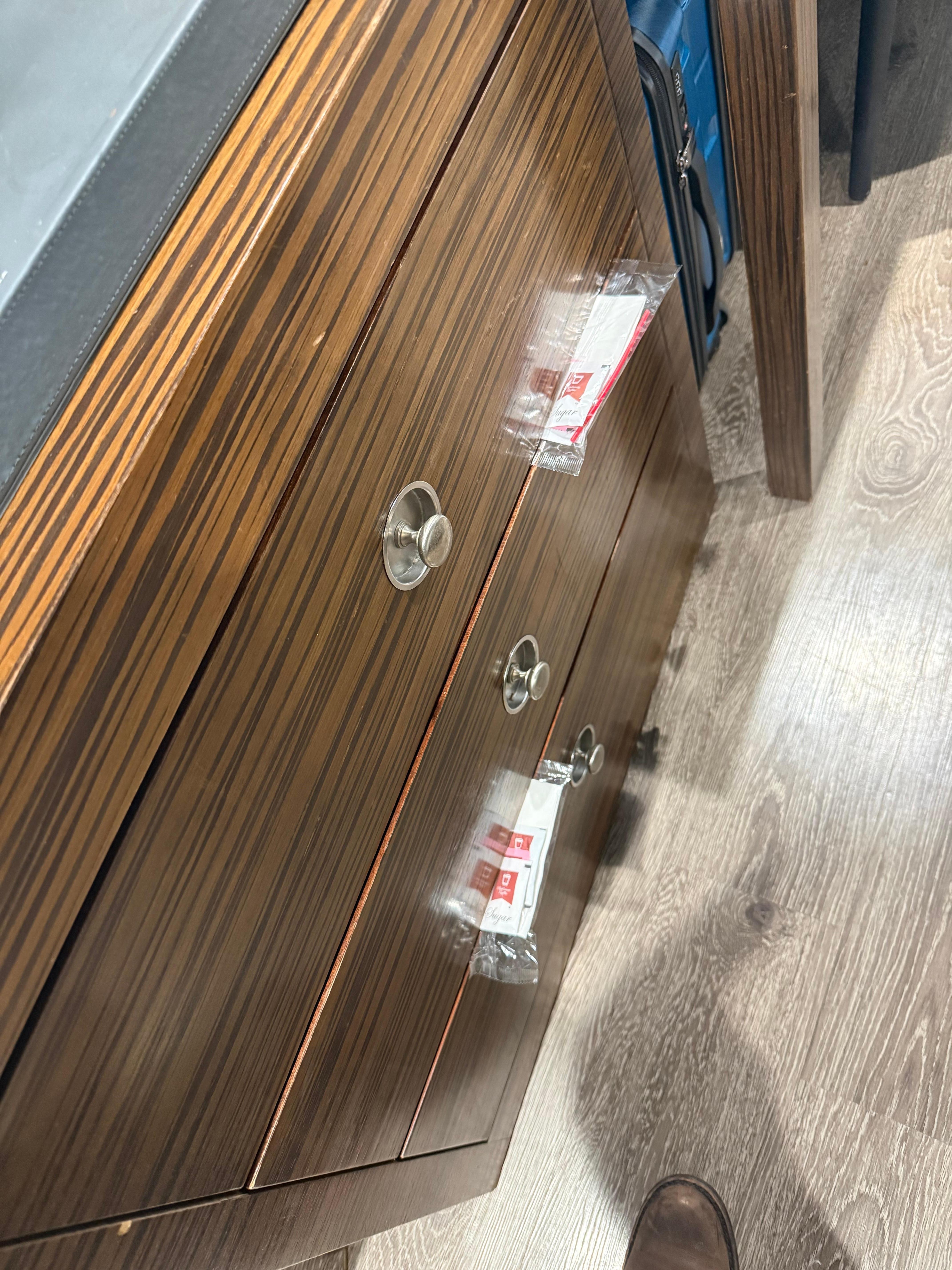 You have to prop the drawers to make them remain closed 