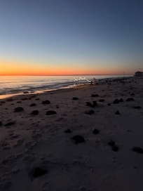 Sunset from the beach directly in front of the property