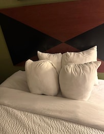 Little pillows on the bed