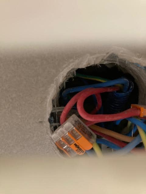 Exposed wires in bathroom - not safe with a child around, for sure.