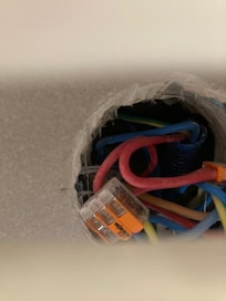 Exposed wires in bathroom - not safe with a child around, for sure.