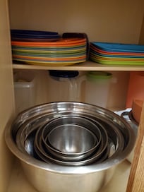 All the kitchen gadgets and things you need, including plastic trays for kids.