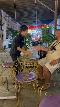 seating area at from of Hotel where we spent several evenings chilling with locals and other travelers …bonus massage place right next door open to early hours of the morning