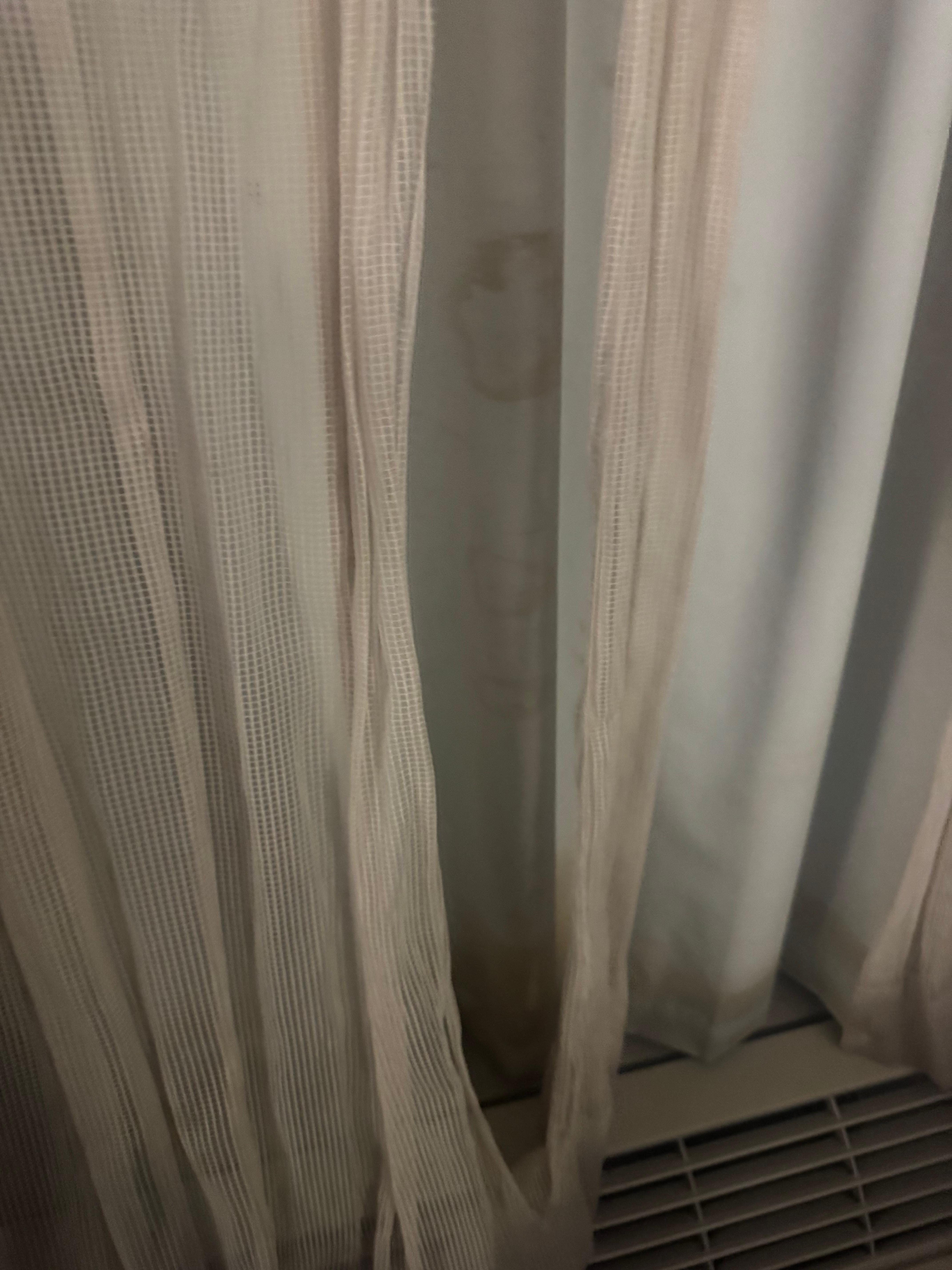 Stained dirty tirn curtsins