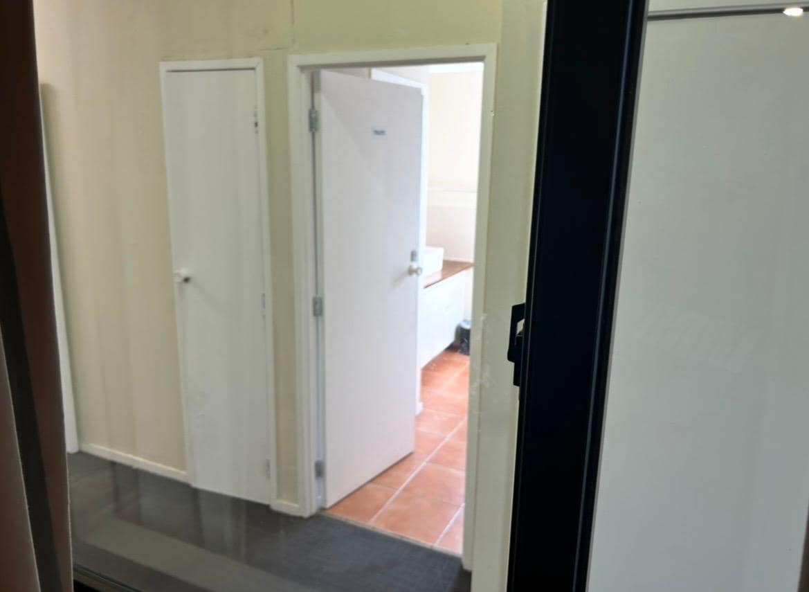 View outside the window of the kitchen and bathroom