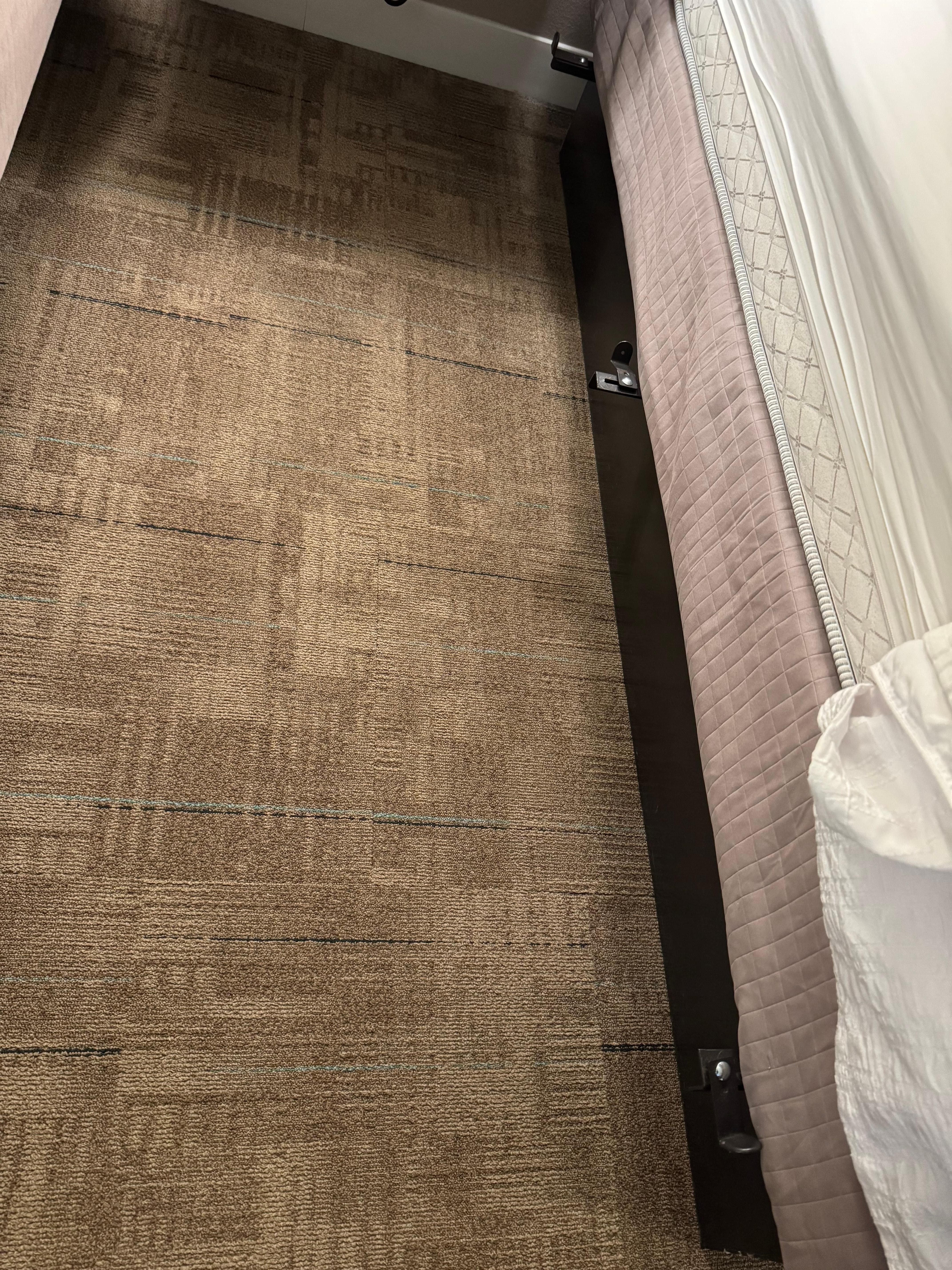 The bed frame had 3 metal spikes sticking out, which scratched both my wife and my dog. 