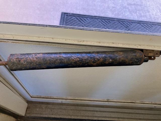 Rusted, dirty entry door