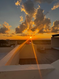 Sunset from the rooftop/private pool deck.