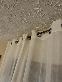 Apparently we are not the only ones with this issue, we found laundry clips already when when we went to try and make the room darker