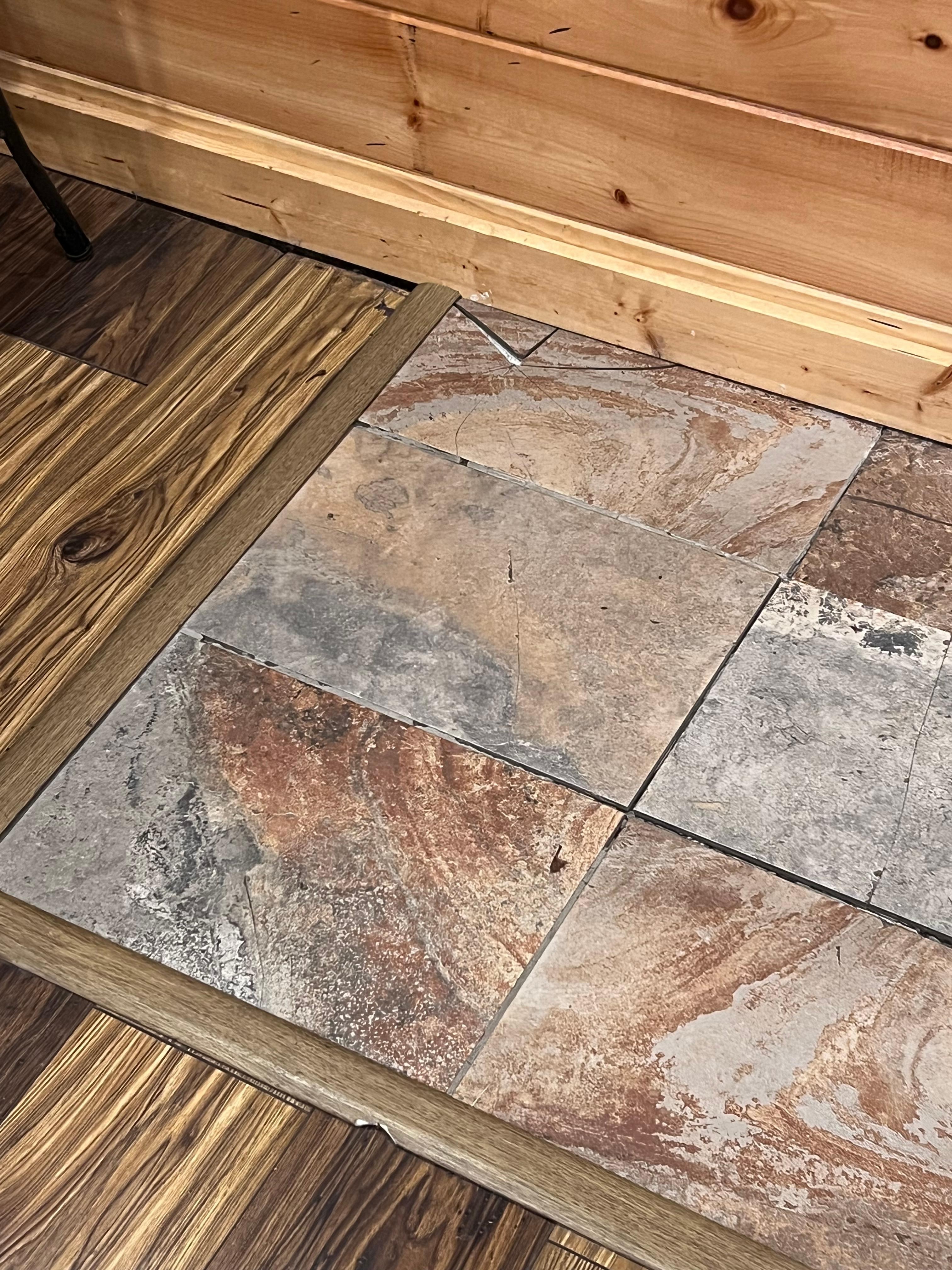 Broken tiles into pool area.