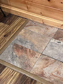 Broken tiles into pool area.