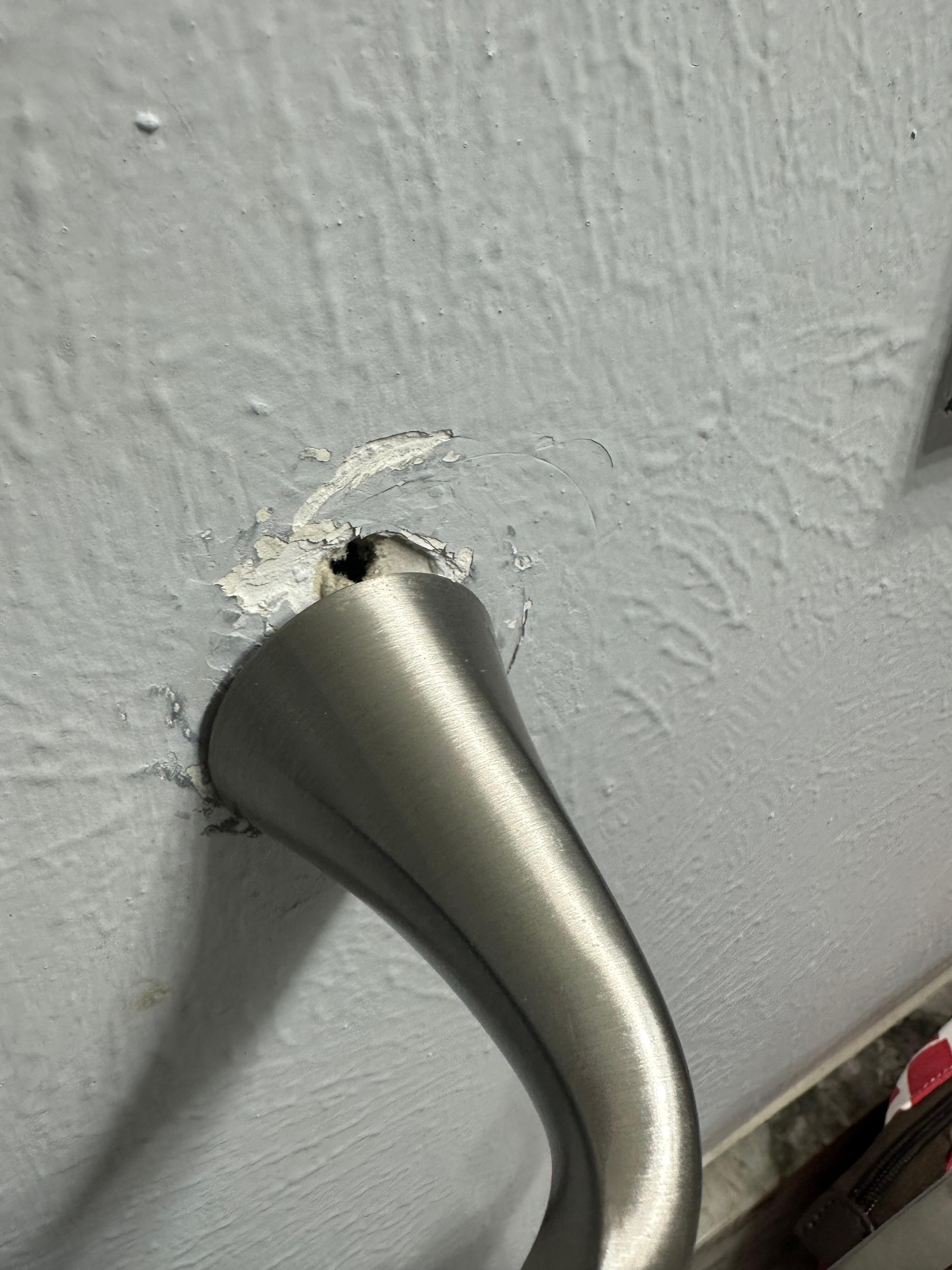 Hand towel holder in guest bath