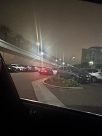 Other cars circling the parking lot due to no parking