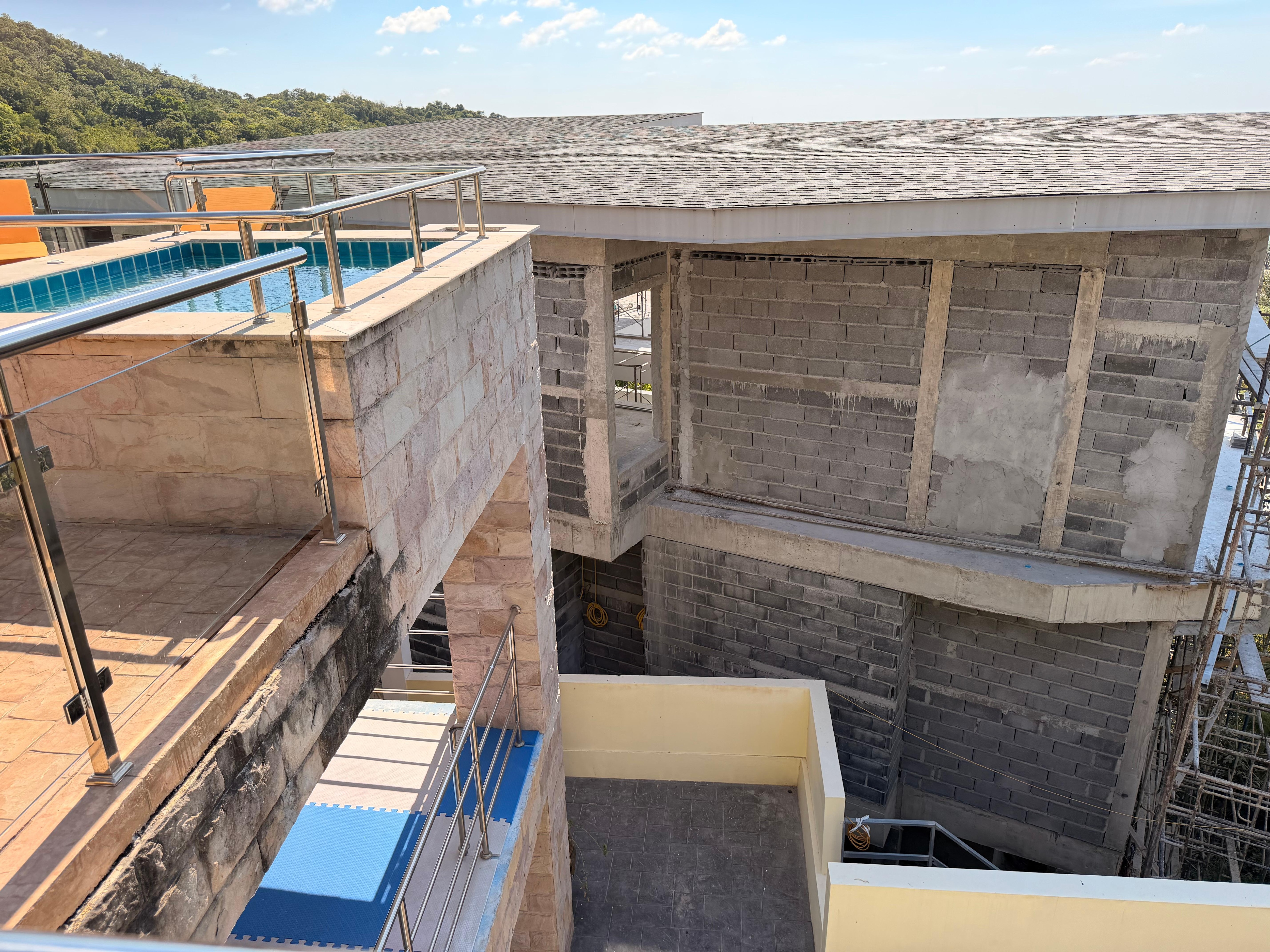 Construction directly in front of ocean view.