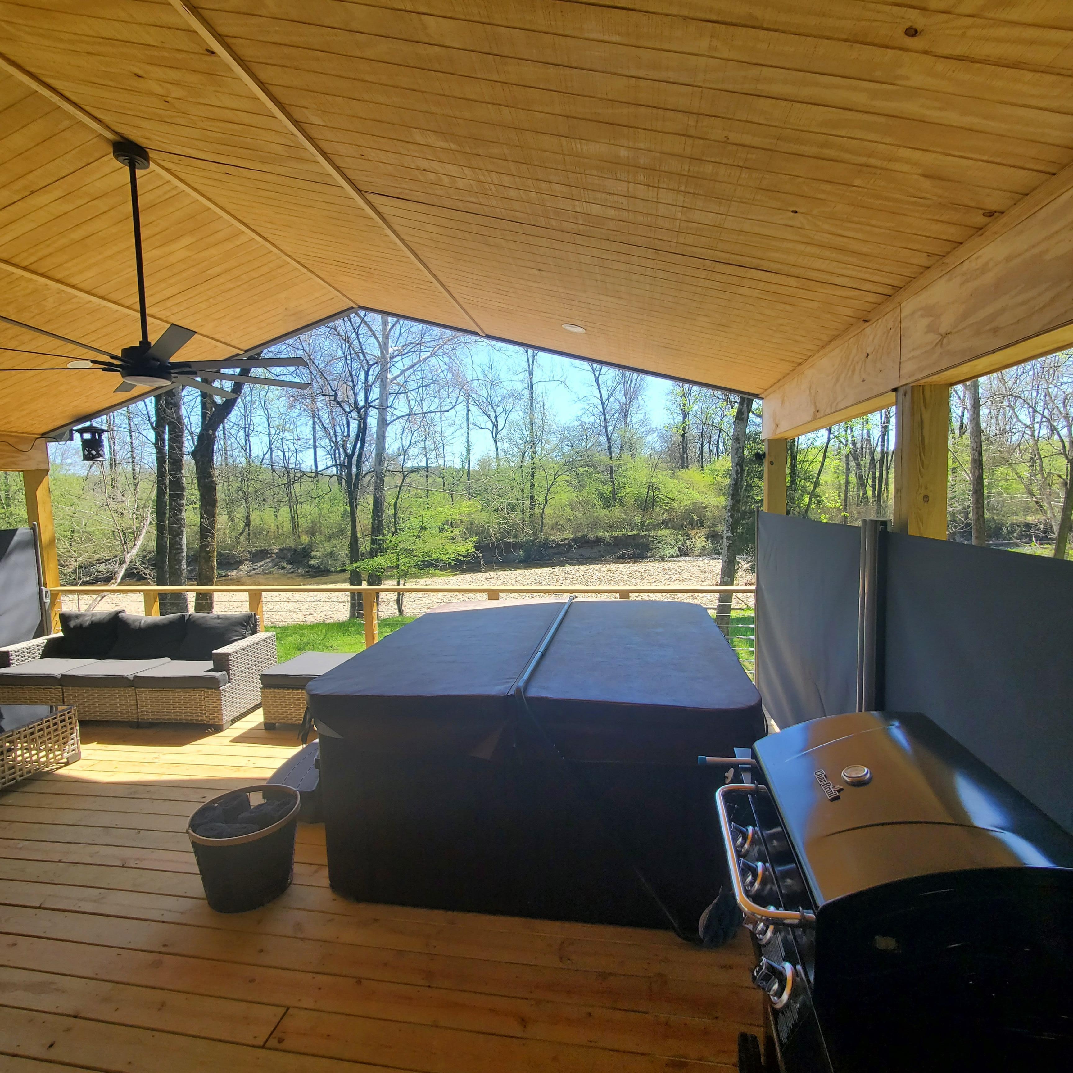 Hot tub with creek in background 