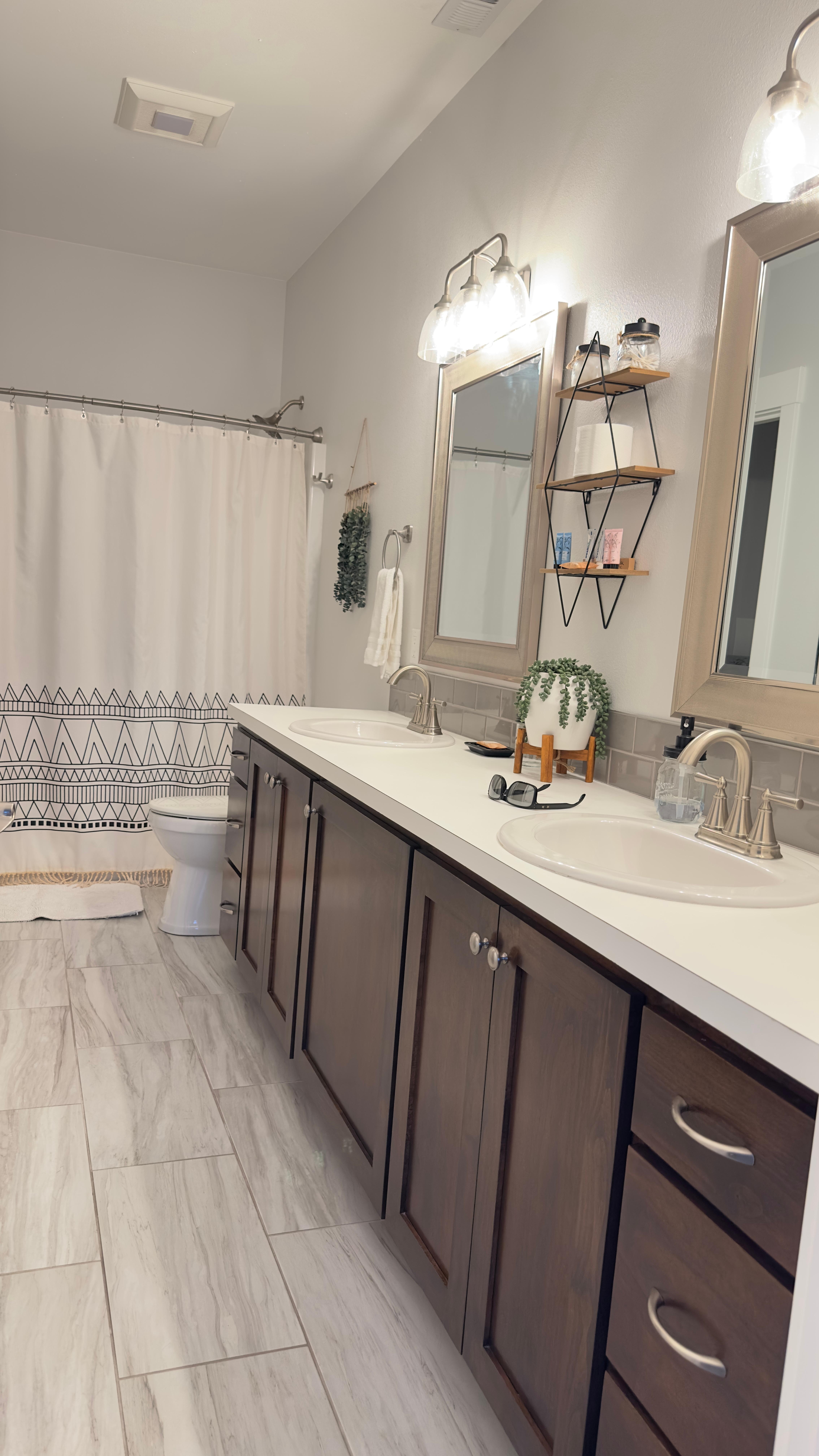 Beautiful comfortable bathroom with attached laundry room, and walking closet