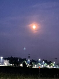 Full moon over Northland Pines high school