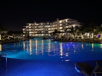 Pool and hotel at night