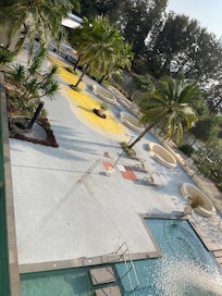 Pool sitting area in front of cafe