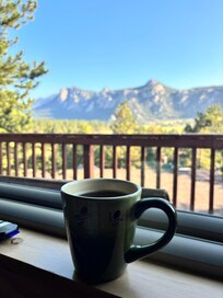 View from the livingroom looking out to the mountains with coffee that was provided!!